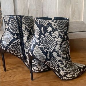 Heeled snake skin booties